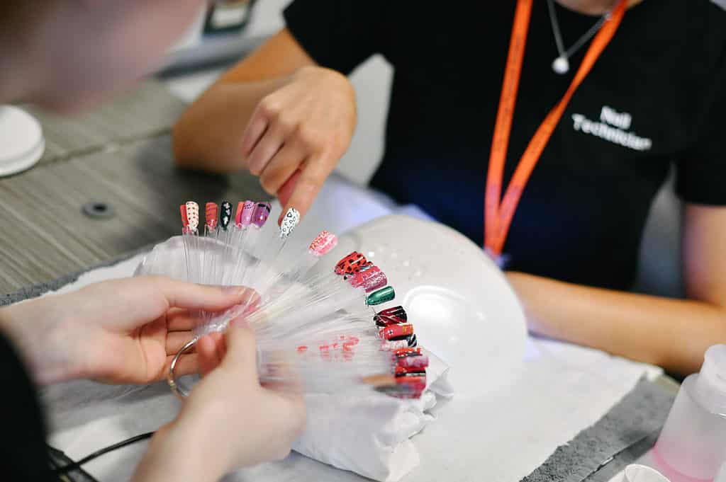 Selection of acrylic nails being chosen