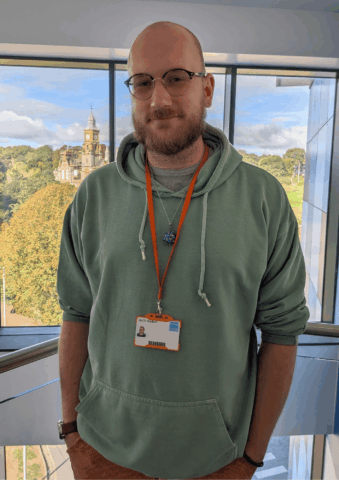 Man standing in front of a picture window
